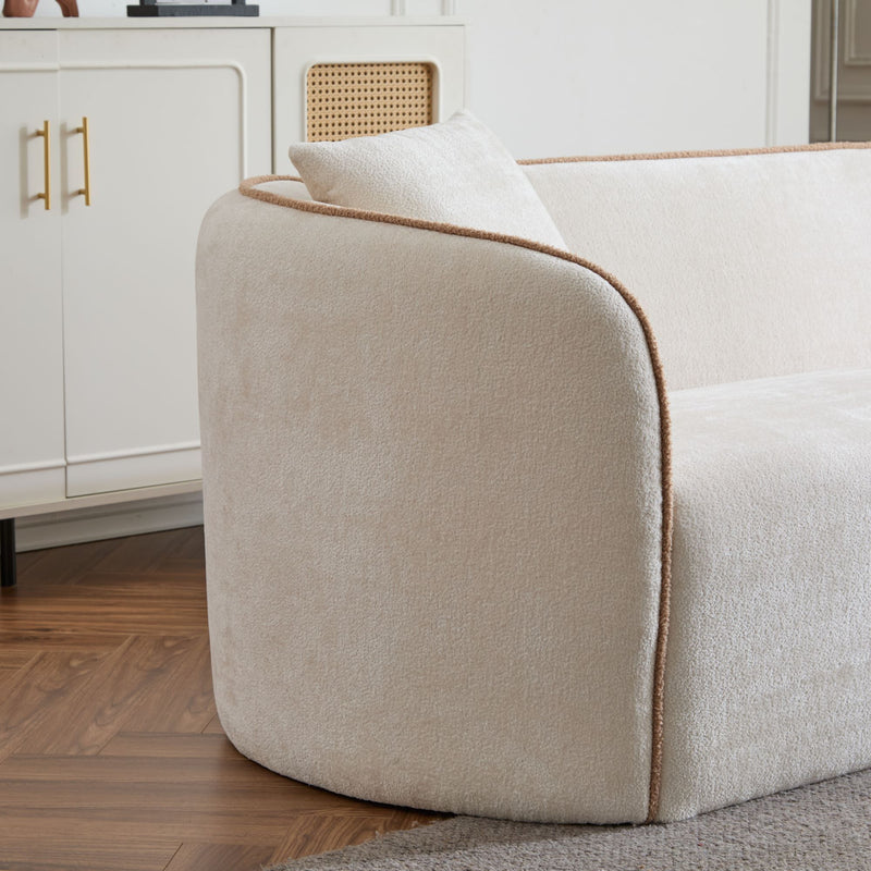 Noble House Coral 3-seater curved stationary sofa with plush cushions and modern design in a living room setting.