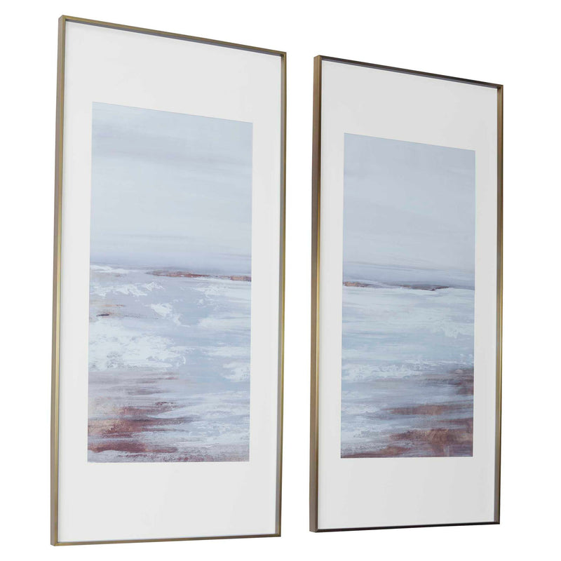 Set of two Uttermost Coastline framed prints featuring light brown ocean and shoreline scenes in elegant frames