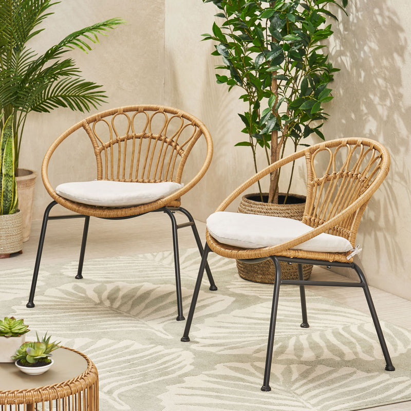 Set of two light brown Noble House Banya chairs with sleek modern design, featuring wood frames and comfortable seats.