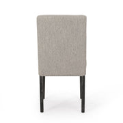 Contemporary Noble House dining chair with upholstered seat and tapered wooden legs, part of a stylish chair set.