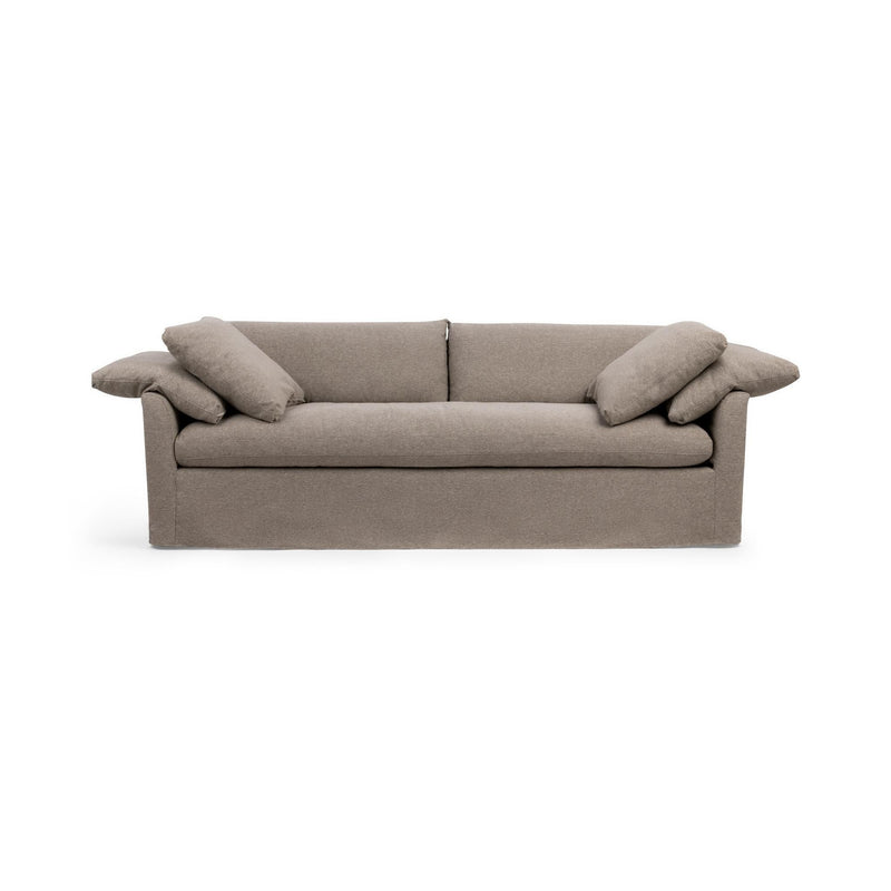 Classic Home Cassiano slip cover sofa in a stationary style with a neutral fabric finish, showcasing a comfortable living room setup.