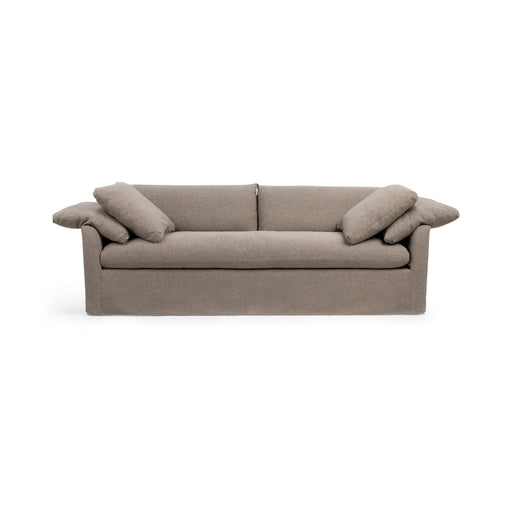 Classic Home Cassiano slip cover sofa in a stationary style with a neutral fabric finish, showcasing a comfortable living room setup.