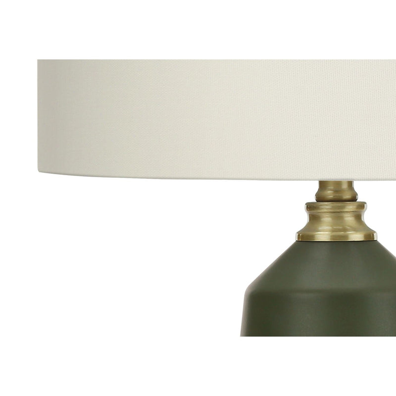 Contemporary green ceramic table lamp by 8th Street with a sleek rounded design and a fabric lampshade.