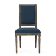 Noble House traditional style dining chair set with fabric upholstery, featuring elegant wooden frames and cushioned seats.