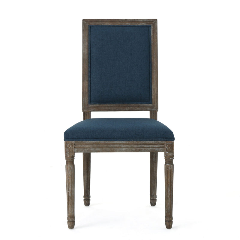 Noble House traditional style dining chair set with fabric upholstery, featuring elegant wooden frames and cushioned seats.