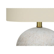 8th Street table lamp with a sleek modern design and soft lighting, perfect for desk or bedside use.