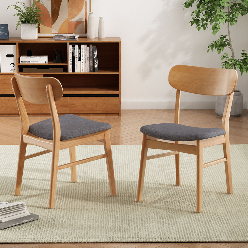 Set of two Noble House dining chairs with wood frames and cushioned seats, elegant and comfortable for dining rooms.