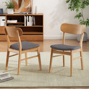 Set of two Noble House dining chairs with cushioned seats, featuring stylish wooden frames and comfortable padding.