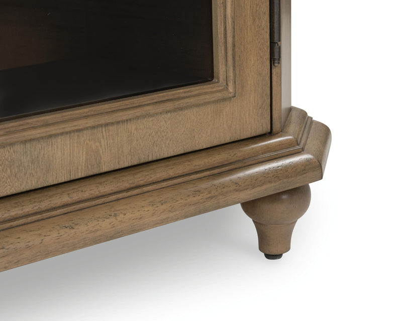 Signature Design by Ashley Barlomore accent cabinet in brown with sleek storage doors and modern style.
