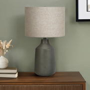 Contemporary concrete table lamp by 8th Street with a sleek, minimalist design, perfect for modern home decor.