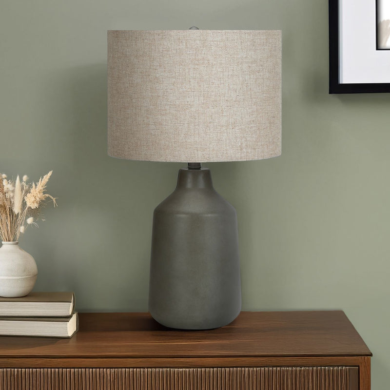 Contemporary concrete table lamp by 8th Street with a sleek, minimalist design, perfect for modern home decor.