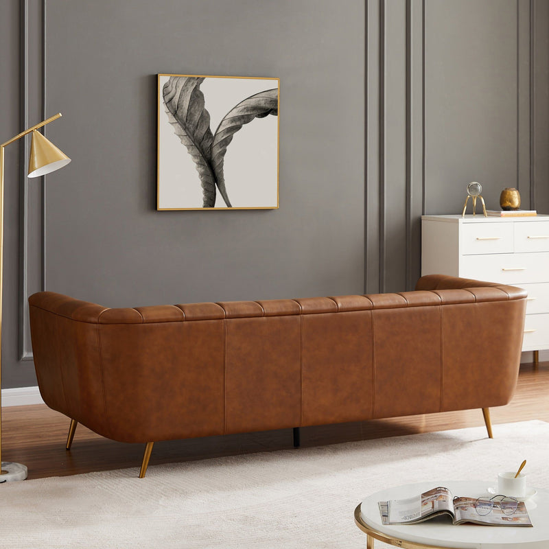 Ashcroft Furniture Ava gold and tan stationary sofa with plush cushions and sleek design, perfect for modern living rooms.