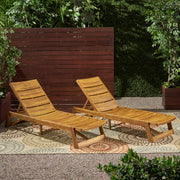 Noble House Maki chaise lounge with modern design, upholstered in neutral fabric and sleek wooden legs.