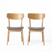 Set of two Noble House dining chairs with cushioned seats, featuring stylish design and comfortable upholstery.