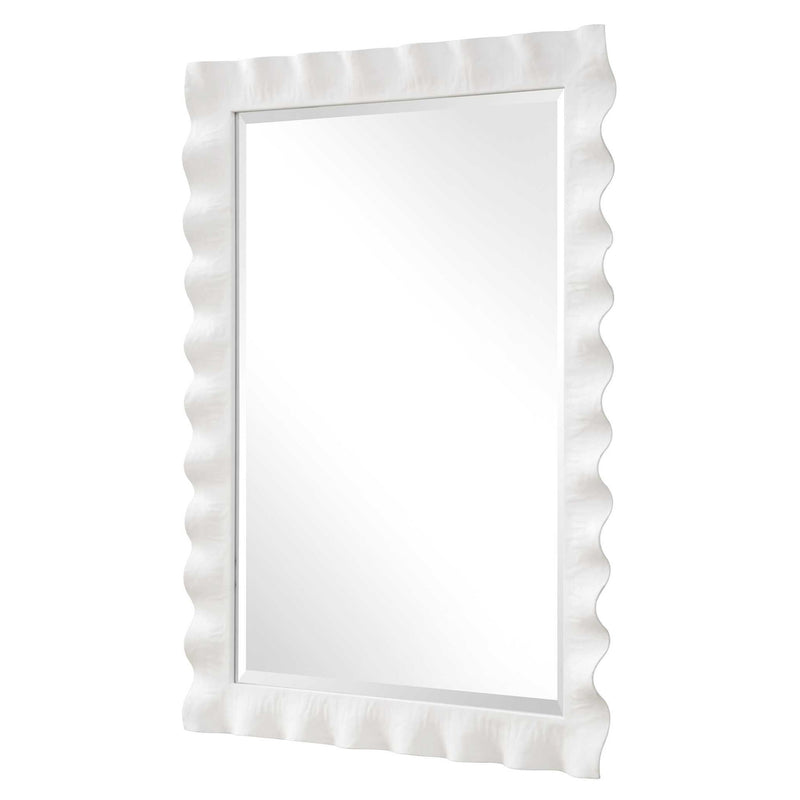 Uttermost Haya scalloped accent mirror with a decorative, scalloped edge, perfect for adding style to any room decor.