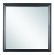 Glory Furniture Primo mirror with a sleek, modern frame reflecting a stylish bedroom interior.