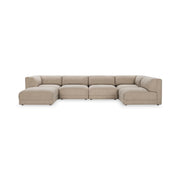 Classic Home Adalynne stationary sectional sofa with plush cushions and modern design, shown in a spacious living room setting.