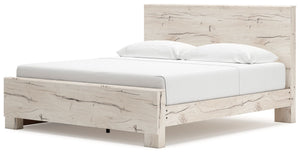 Signature Design by Ashley Lawroy panel bed with built-in storage drawers, showcasing a modern wooden bed frame with ample storage space.