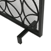 Noble House Thayer single panel iron fireplace screen with geometric design, black metal with intricate cutout pattern.