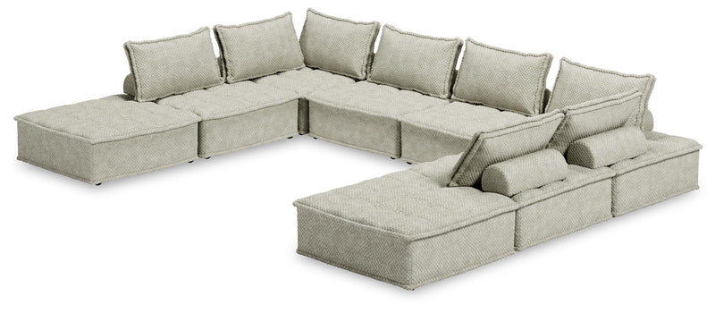 Signature Design by Ashley stationary Bales sectional sofa with plush cushions and modern design, shown in a living room setting.