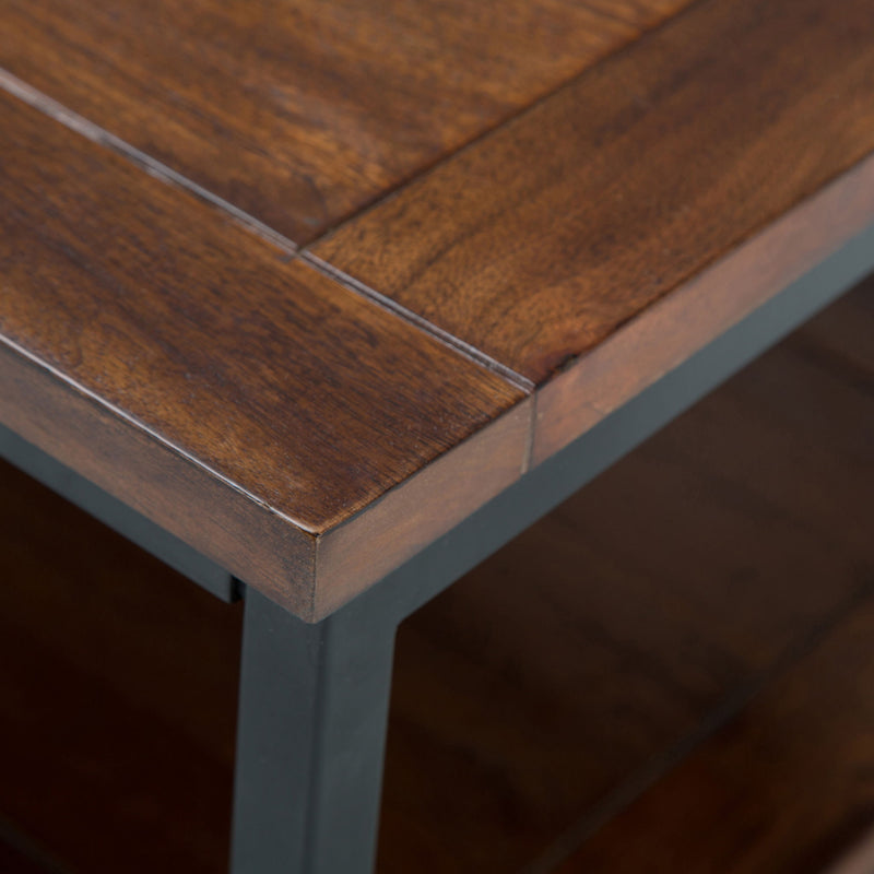Dark cognac brown Skyler coffee table by Simpli-Home with a sleek wooden surface and sturdy legs in a modern living room setting.