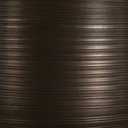 Uttermost Calderone bronze table lamp with a sleek, modern design and a cylindrical shade, perfect for stylish home lighting.