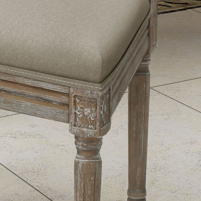 Noble House traditional style dining chair set with fabric upholstery, featuring elegant wooden frames and cushioned seats.