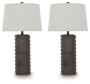 Pair of Signature Design by Ashley Neilett poly table lamps in antique brown with textured ceramic bases and beige fabric shades.