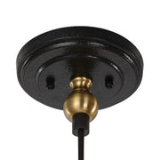 Uttermost Adastra 1-light pendant in antique brass, showcasing a sleek modern pendant light fixture with a warm metallic finish.