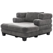 Noble House oversized chaise lounge sofa bed with deep seat and layered armrests, showcasing plush upholstery and modern design.