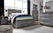 Signature Design by Ashley Baystorm gray 8-piece panel bedroom set featuring a bed, dresser, mirror, and matching furniture.