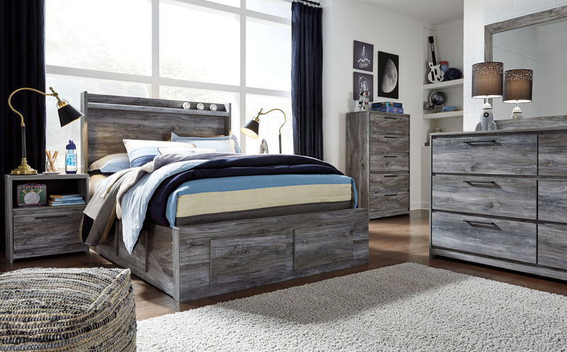 Signature Design by Ashley Baystorm gray 8-piece panel bedroom set featuring a bed, dresser, mirror, and matching furniture.