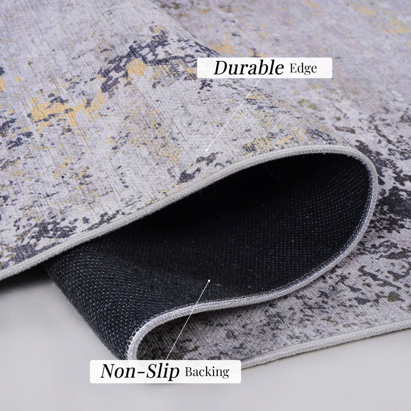 Maval - 6' X 9' Washable Area Rug - Gray / Gold - R&R Furniture Gallery (Fountain Valley, CA)