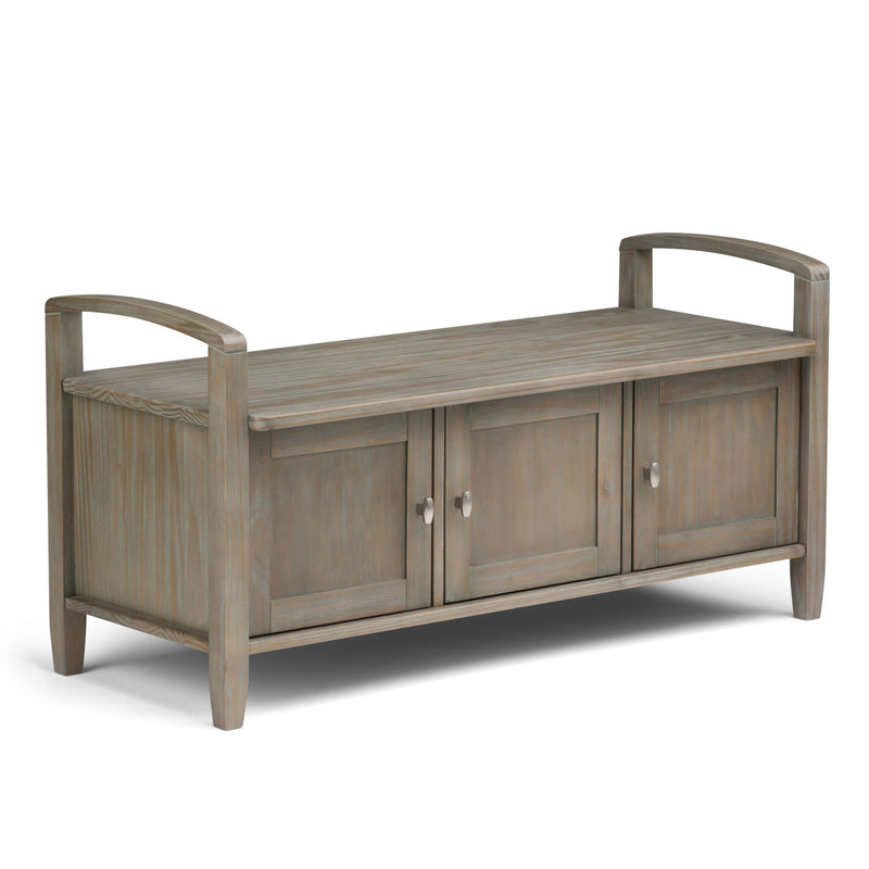 Handcrafted Warm Shaker entryway storage bench by Simpli-Home featuring a wooden seat and built-in storage compartment.