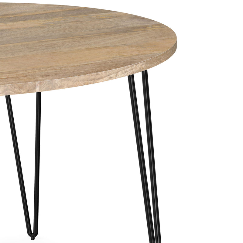 Simpli-Home Hunter round dining table with natural wood finish, showcasing smooth surface and sturdy legs for elegant dining space.