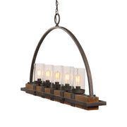 Uttermost Atwood 5-light rustic linear pendant chandelier with light brown finish hanging with visible bulbs and metal frame.