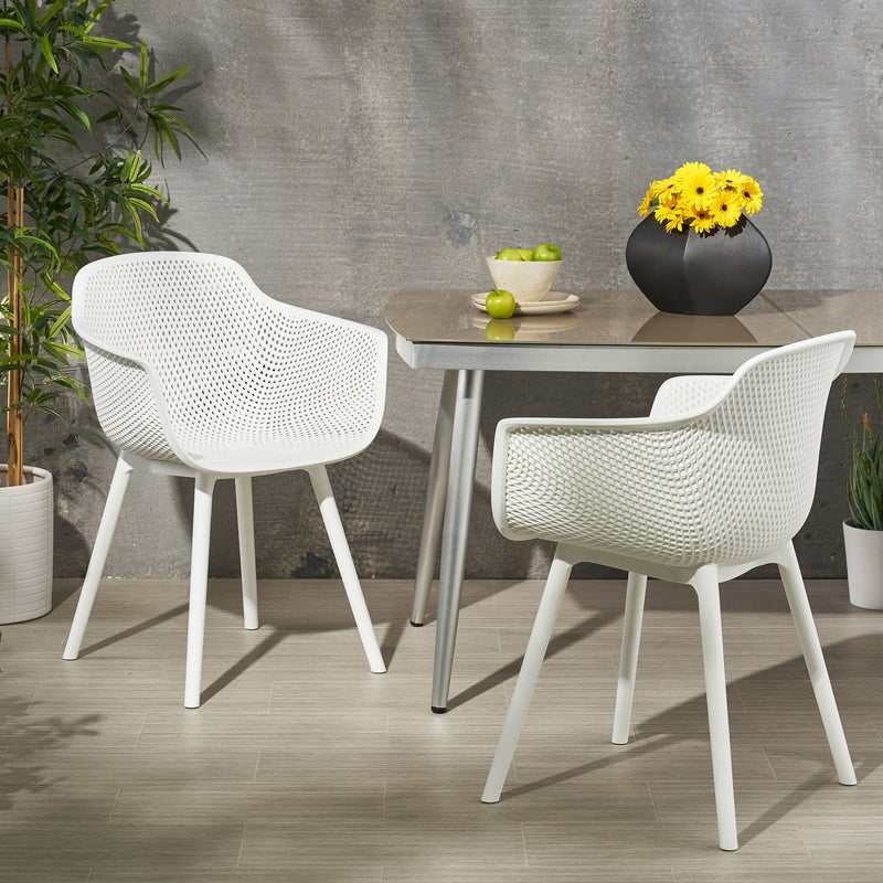 Pair of Noble House Lotus chairs in a set, featuring modern design with wooden legs and sleek upholstered seats.