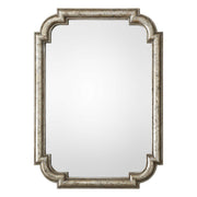 Uttermost Calanna wall mirror with antique silver finish, featuring a decorative frame and reflective glass for elegant wall decor.