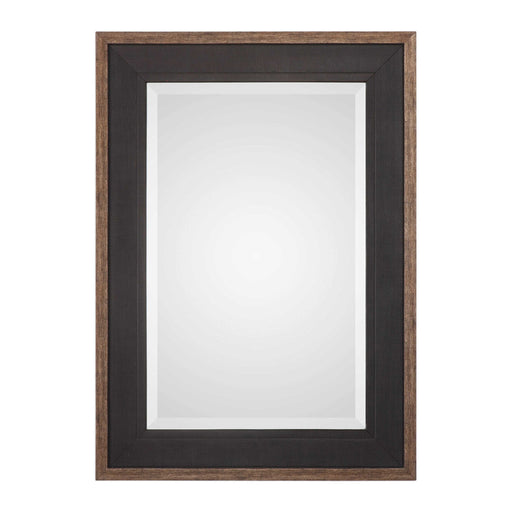 Uttermost Staveley Rustic Black Wall Mirror with a textured wooden frame, stylish and versatile for modern or rustic decor.