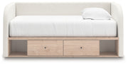 Upholstered Signature Design by Ashley® Arloster day bed with plush fabric and wooden legs, ideal for guest rooms or lounges.