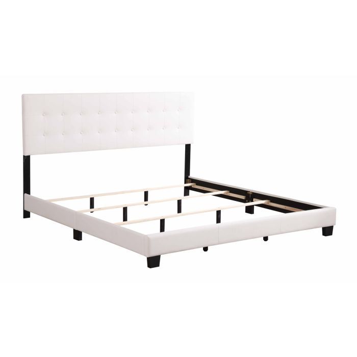 Glory Furniture Caldwell upholstered bed with a padded headboard and neutral fabric, showcasing a modern bedroom design.