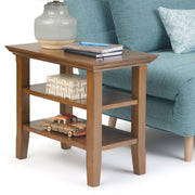 Handcrafted Acadian narrow side table by Simpli-Home featuring a wooden surface and sleek design.