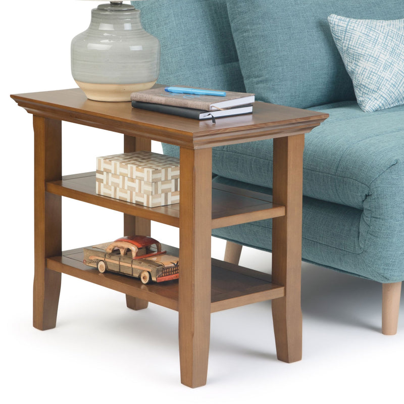 Handcrafted Acadian narrow side table by Simpli-Home featuring a wooden surface and sleek design.