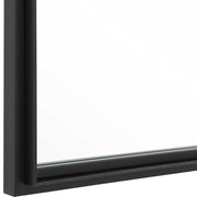 Black iron window mirror by Uttermost, featuring a classic accent mirror design with a rustic, vintage style frame.