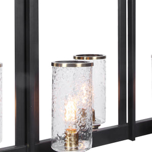 Uttermost Jarsdel 6-light industrial island pendant lighting in black with metal jars, ideal for modern kitchen or dining area decor.