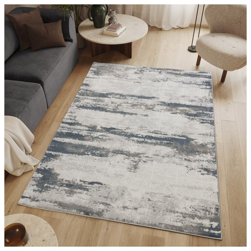 Geometrix - 5'3" X 7'3" Area Rug With Geometric 3D Effect - Gray / Ivory - R&R Furniture Gallery (Fountain Valley, CA)