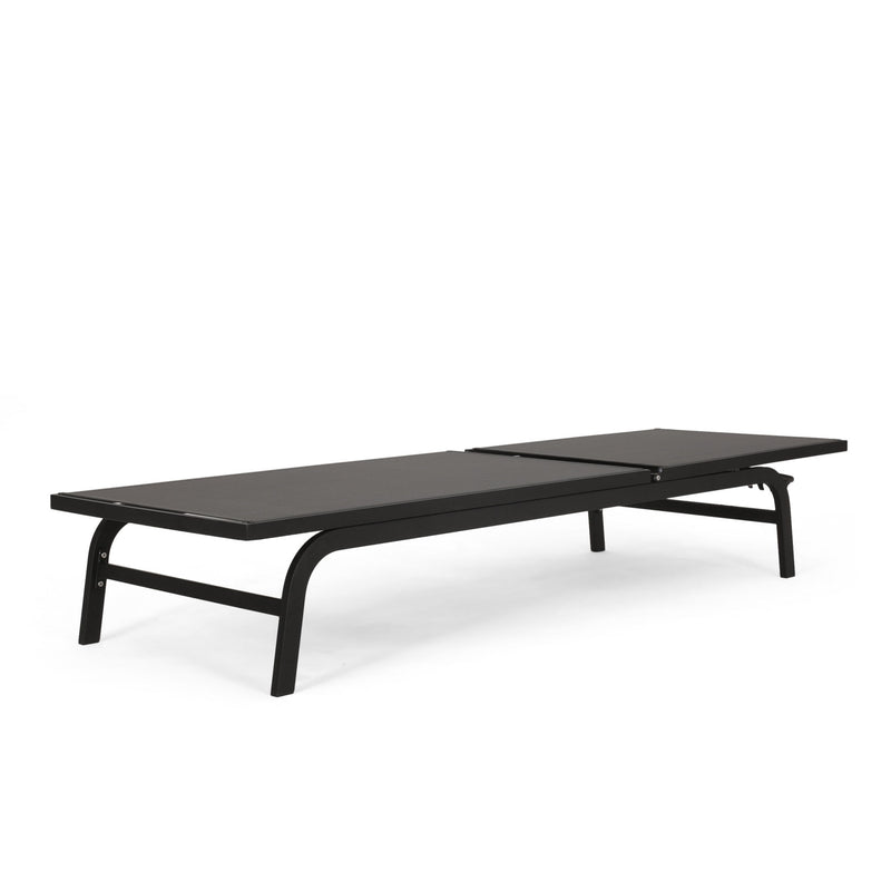 Noble House Finn outdoor chaise lounge with cushioned seat and sleek modern design for outdoor relaxation.