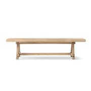 Jennifer Taylor Home Hawthorne dining bench in natural wood finish, with a sleek, minimalist design suitable for modern dining rooms.