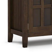 Large brown Acadian sideboard buffet by Simpli-Home, featuring spacious storage with sleek wood finish and modern design.