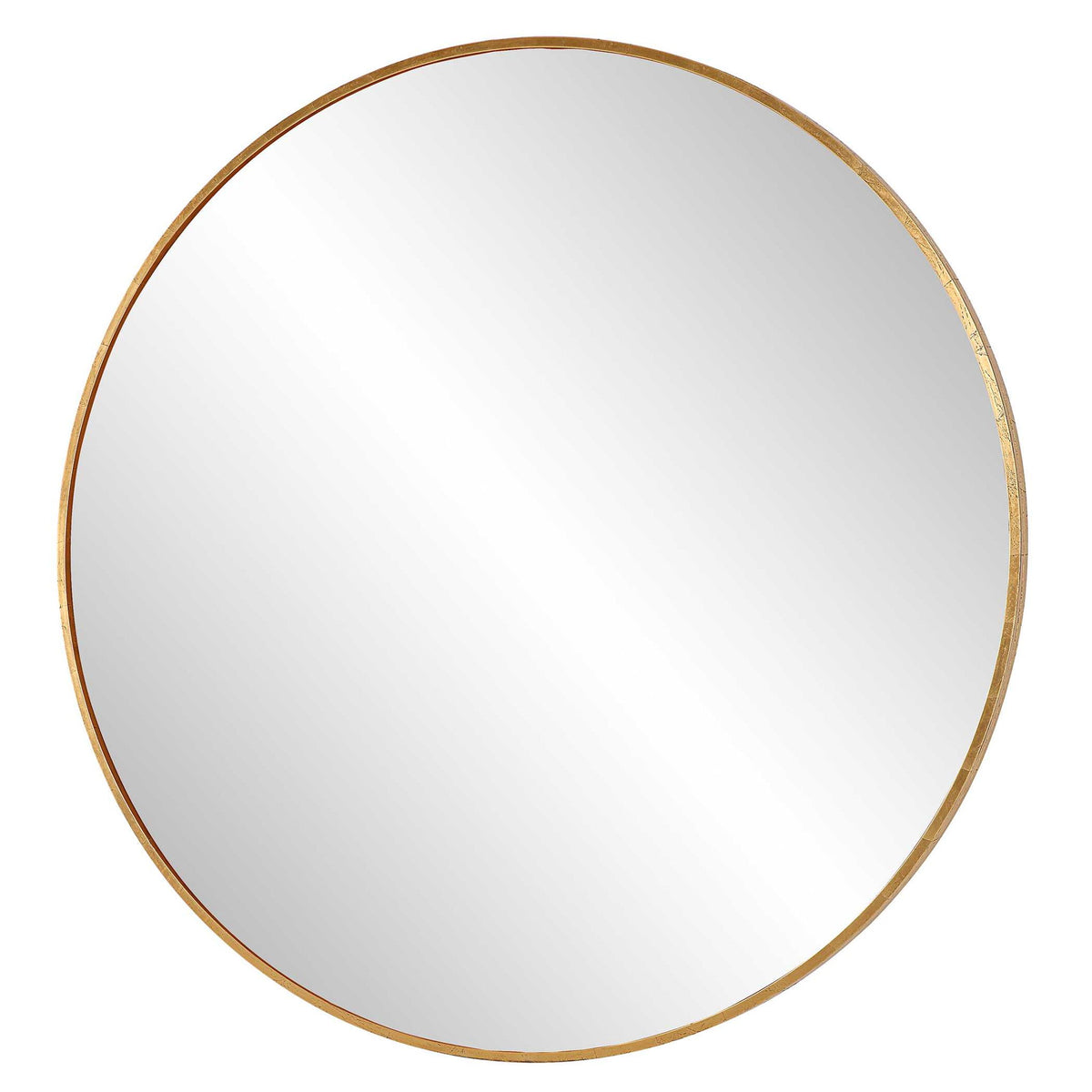 Uttermost Junius round wall mirror with a sleek frame, hanging on a wall, reflecting a modern interior.